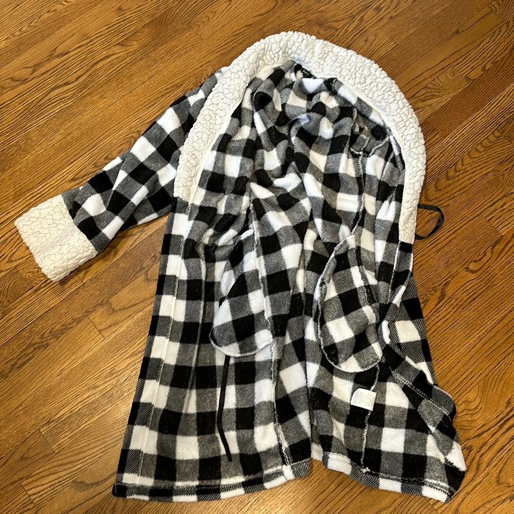 Checkered black, and white robe